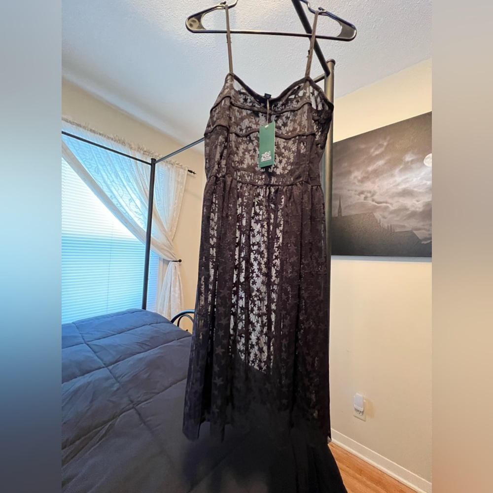 Sheer dress with star detail.